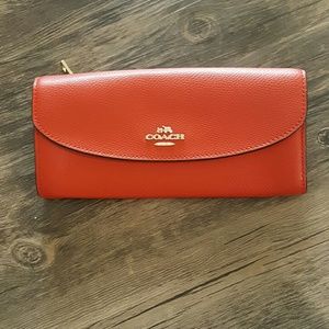 Red/orange Coach wallet